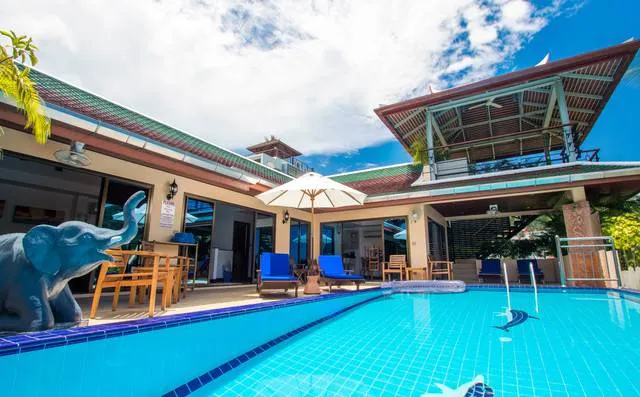 Poolside relaxation area with outdoor seating